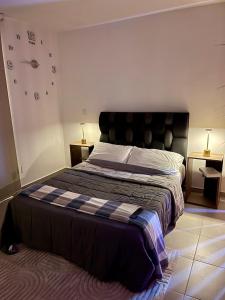 Кровать или кровати в номере Moderno apartamendo con Rooftop y Jacuzi +22 фотографии