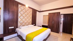 Ένα ή περισσότερα κρεβάτια σε δωμάτιο στο Zeno Village Resort, Near 900 Kandi Wayanad