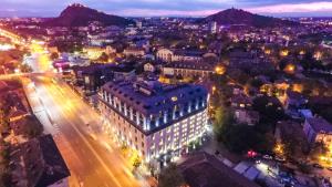 an overhead view of a city at night at Capital City Center Apart Residence in Plovdiv