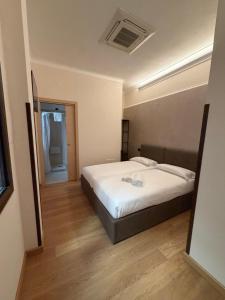 a bedroom with a large bed in a room at Le Stanze Del Duca in Ferrara +31 photos