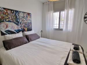 En eller flere senge i et værelse på Quiet and close to the beach A107 + 12 billeder