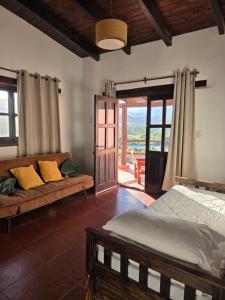 Postel nebo postele na pokoji v ubytování Cabañas Altos de Cachi