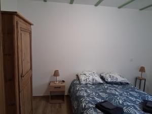 Postel nebo postele na pokoji v ubytování Gîte de la Motte