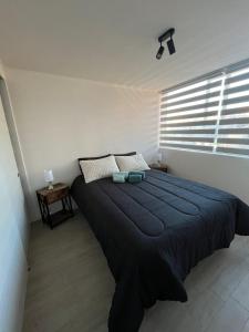 En eller flere senge i et værelse på Como en casa