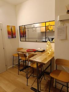 a dining room with a table and chairs at Castle apartment Aga in Uzzano