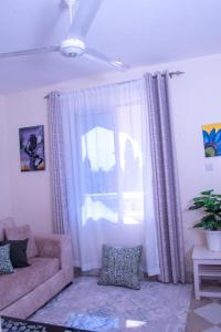 Posezení v ubytování Makao Kilifi - modern & secure 1BR by the creek