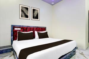 Ένα ή περισσότερα κρεβάτια σε δωμάτιο στο SPOT O SKY LINE