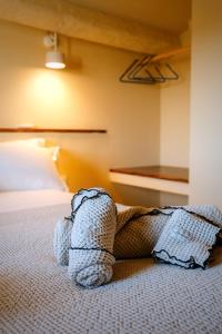 Ένα ή περισσότερα κρεβάτια σε δωμάτιο στο CaLagneta - Art i Vi