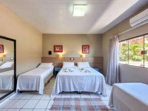 Postel nebo postele na pokoji v ubytování Hotel Paraíso das Águas Bonito + 49 fotografií