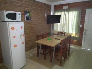 Η κουζίνα ή μικρή κουζίνα στο Lo de dany +2 φωτογραφίες