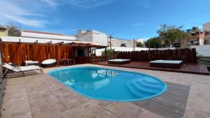 Πισίνα στο ή κοντά στο Pousada Loft Praia dos Anjos