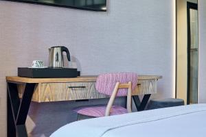 Postel nebo postele na pokoji v ubytování Boutique Hotel Luna Triunfo Granada