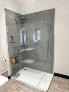 Ένα μπάνιο στο The Kedleston King Size Beds