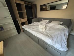 Ένα ή περισσότερα κρεβάτια σε δωμάτιο στο Studio centre ville