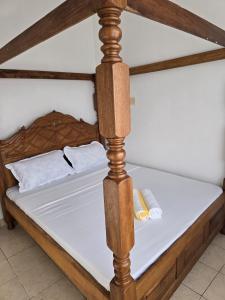 Ένα ή περισσότερα κρεβάτια σε δωμάτιο στο Alpha Homes