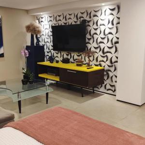 TV a/nebo společenská místnost v ubytování cabanaloft994