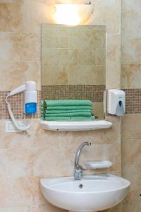 Koupelna v ubytování Delmar Apartments by Peaks