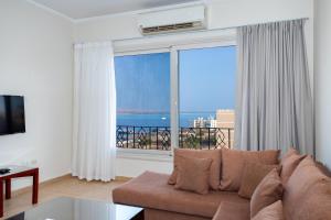 TV a/nebo společenská místnost v ubytování Delmar Apartments by Peaks