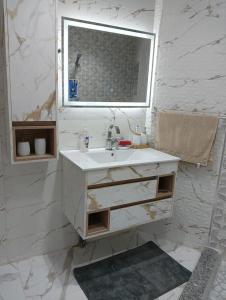 Et badeværelse på Appartement cosy