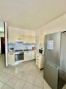 Η κουζίνα ή μικρή κουζίνα στο Appartamento Lido Vistamare