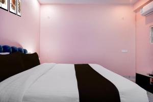 Ένα ή περισσότερα κρεβάτια σε δωμάτιο στο Hotel O TOYBOX