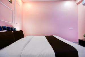 Ένα ή περισσότερα κρεβάτια σε δωμάτιο στο Hotel O TOYBOX