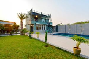 Πισίνα στο ή κοντά στο The Hill's Stay | 3BHK Villa | Dancenter