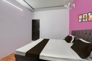 Postel nebo postele na pokoji v ubytování Hotel O by OYO Prime Stay