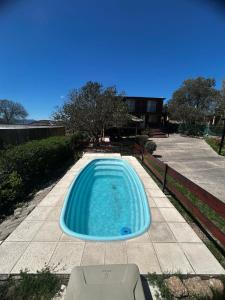 Bazén v ubytování Cabañas EzeNic nebo v jeho okolí + 7 fotografií