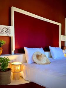 Ένα ή περισσότερα κρεβάτια σε δωμάτιο στο Domaine JJ