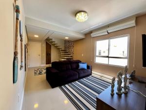 Et opholdsområde på Apartamento Duplex Palmas, 2 quartos, 7 min da praia!