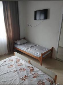 Ένα ή περισσότερα κρεβάτια σε δωμάτιο στο Hotel PRINCi