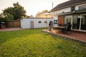 Κήπος έξω από το FeWo Glöckchen - Hell, Garten und Terrasse in ruhiger Lage