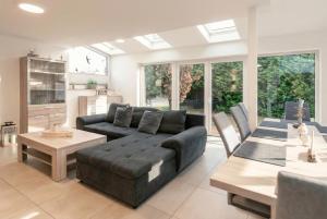 Χώρος καθιστικού στο FeWo Glöckchen - Hell, Garten und Terrasse in ruhiger Lage