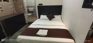 Postel nebo postele na pokoji v ubytování Shree chendur family Residency