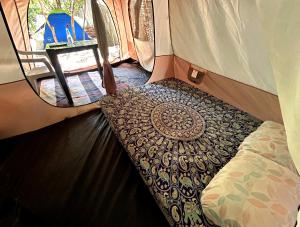 Ένα ή περισσότερα κρεβάτια σε δωμάτιο στο GaiaPipa ComunidArte +39 φωτογραφίες