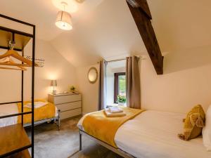 a bedroom with two beds and a window at 2 Bed in Newton-on-Rawcliffe 88957 in Newton