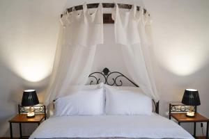 Postel nebo postele na pokoji v ubytování aEN Fine Living