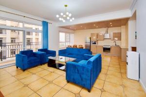 Η κουζίνα ή μικρή κουζίνα στο Chateau Apartments Hotel