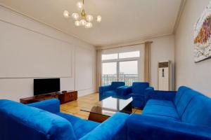 Μια τηλεόραση ή/και κέντρο ψυχαγωγίας στο Chateau Apartments Hotel