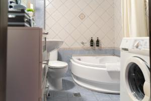 Koupelna v ubytování aEN Fine Living + 56 fotografií