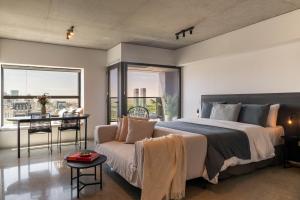 En eller flere senge i et værelse på Top Rentals Huergo 475 + 68 billeder