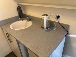 Η κουζίνα ή μικρή κουζίνα στο Butterfly