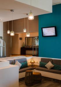 Телевизор и/или развлекательный центр в Hotel Katuxlan