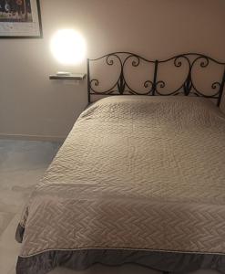 Yolunamar -appartamento- في ألتيدونا: غرفة نوم بسرير ولحاف ابيض +5 صور