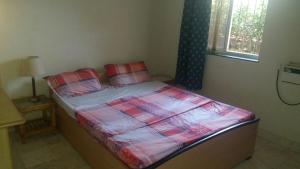 Postel nebo postele na pokoji v ubytování Justin Apartment