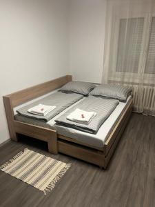 Ένα ή περισσότερα κρεβάτια σε δωμάτιο στο Apartman Riegrova 41