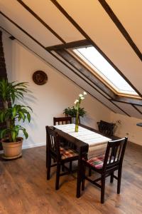 a dining room with a table and two chairs at Haus-Elena in Bestwig