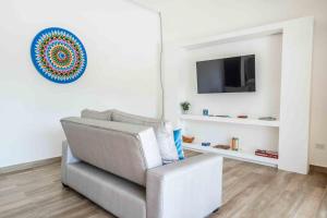 Μια τηλεόραση ή/και κέντρο ψυχαγωγίας στο Casa Ocean with Studio -Triskele Retreat