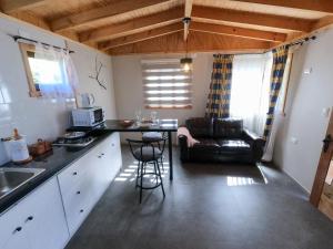 Kuchyň nebo kuchyňský kout v ubytování Cabañas Raco + 10 fotografií